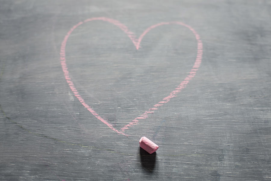 Chalk and heart shape on blackboard #1 Photograph by Ian Nolan