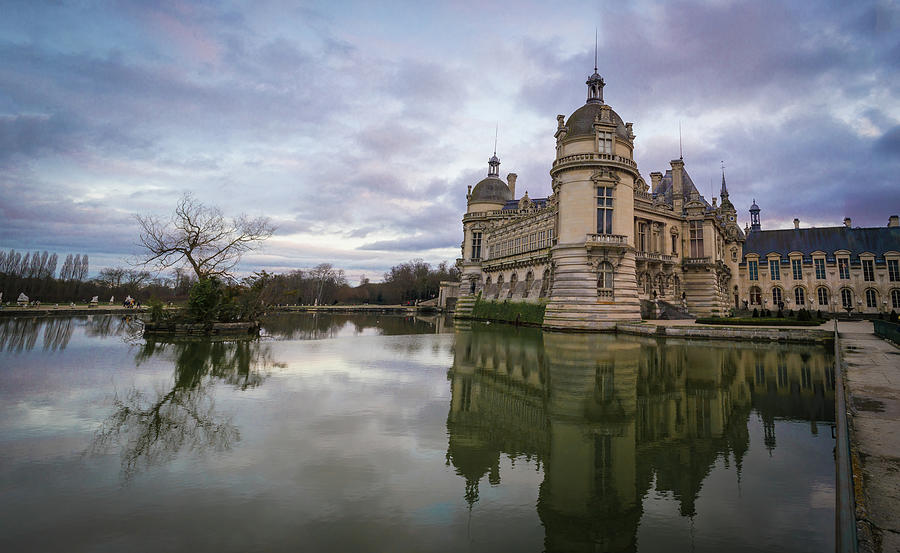 Chantilly Castle at dusk #1 Photograph by Jean-Luc Farges