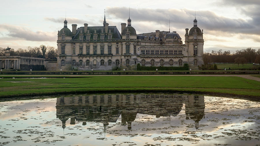 Chantilly Castle at sunset #1 Photograph by Jean-Luc Farges