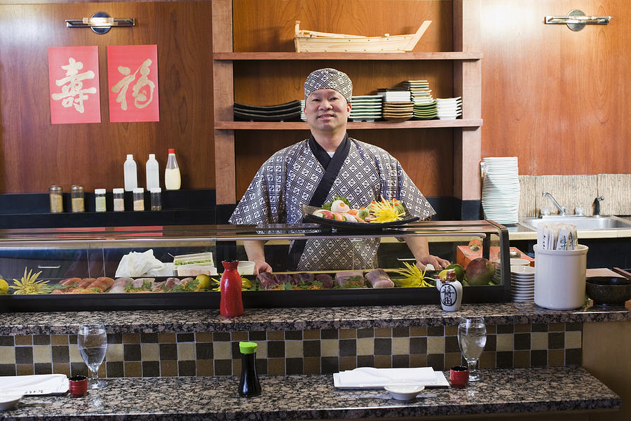 Chef with sushi #1 Photograph by Jupiterimages