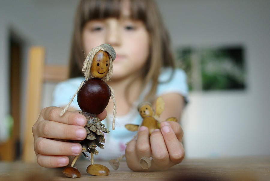 Chestnut and acorn stick figures (children and creativity) #1 Photograph by Alexandra Jursova