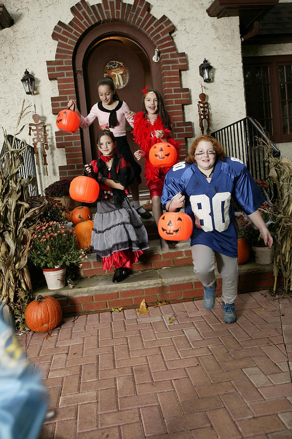 Children trick-or-treating #1 Photograph by Comstock Images