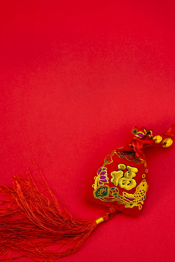 Chinese new year decorations and Auspicious ornaments on red bac #1 Photograph by Pixs4u