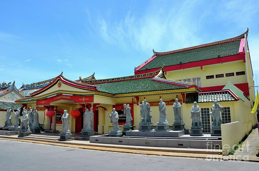 Chinese temple building with statues of gods and wood door Pattani Thailand #2 Photograph by Imran Ahmed