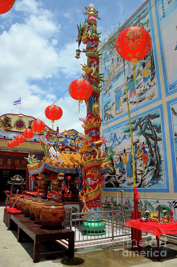 Chinese temple with urns art and red lanterns and Thai flag Pattani Thailand #3 Photograph by Imran Ahmed