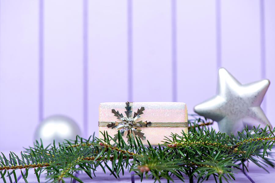 Christmas decoration on a purple striped background - selective #1 Photograph by DiyanaDimitrova