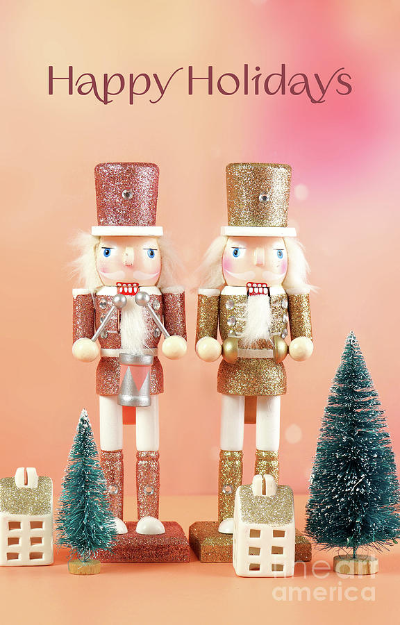 Christmas nutcracker ornaments and gifts against a modern coral  #1 Photograph by Milleflore Images