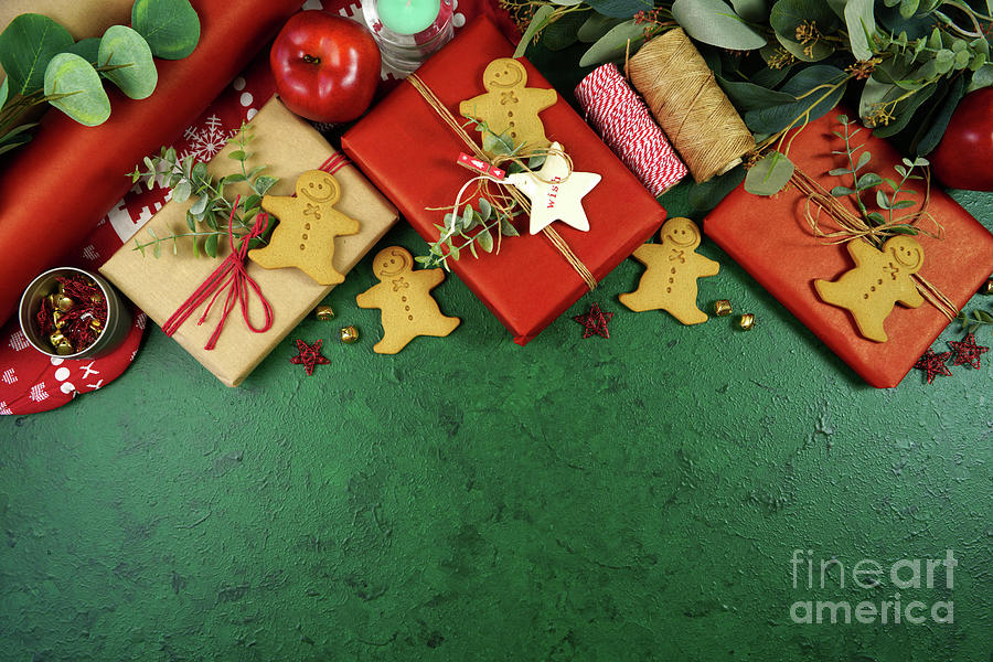 Christmas red and green theme gift wrapping top view flat lay. #1 Photograph by Milleflore Images