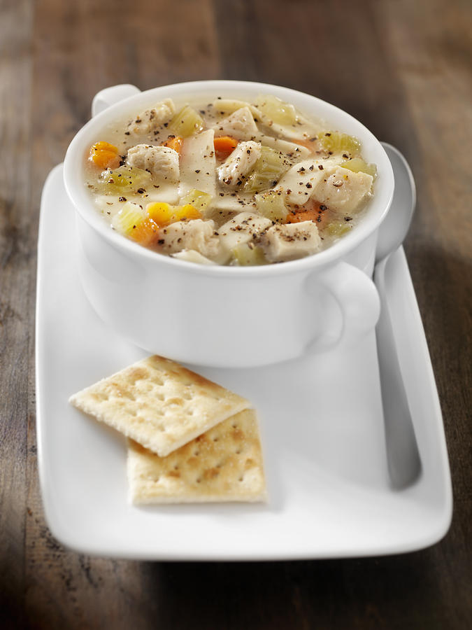 Chunky Chicken Noodle Soup with Saltine Crackers #1 Photograph by LauriPatterson
