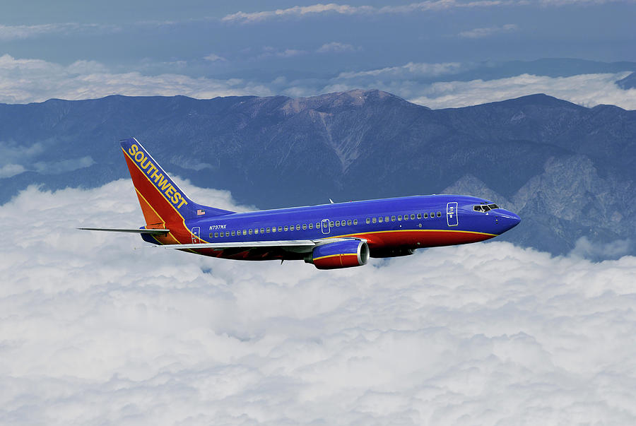 Classic Southwest Airlines Boeing 737 over Mountains #1 Mixed Media by Erik Simonsen