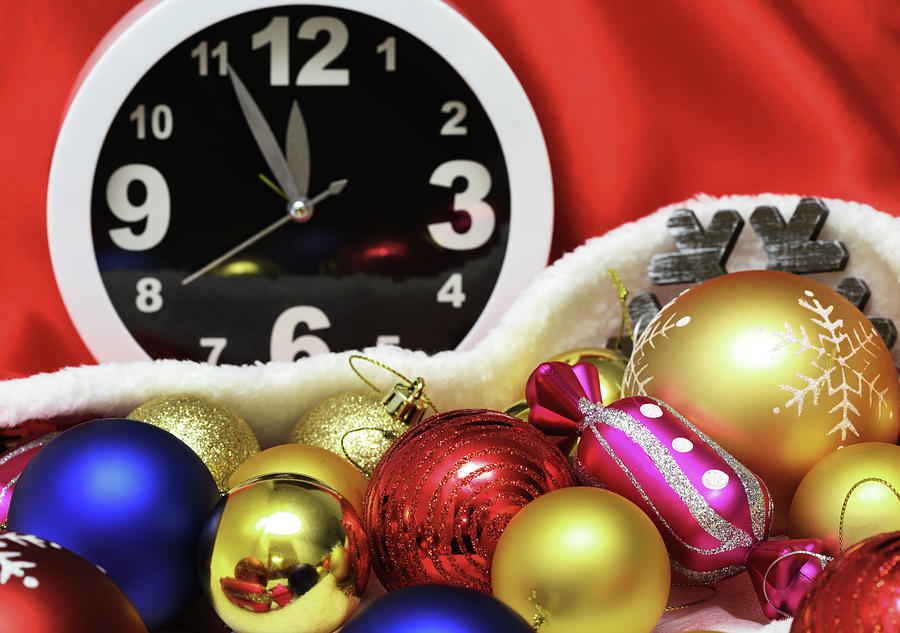 Clock and christmas balls and toys #1 Photograph by Mikhail Kokhanchikov