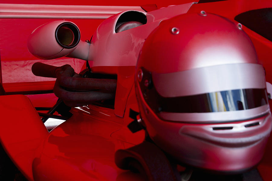 Close-up of a crash helmet on a racecar #1 Photograph by Glowimages
