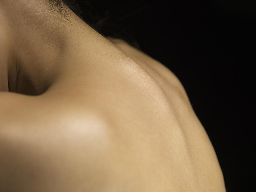Close-up of a womans body #1 Photograph by Kokouu