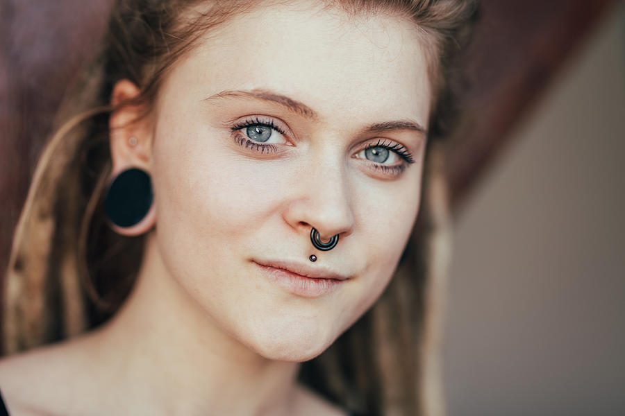 Close-up of beautiful young woman with nose ring #1 Photograph by Nikada