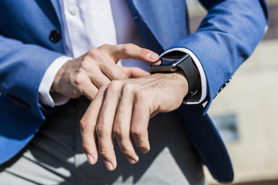 Close-up of businessman with smartwatch #1 Photograph by Westend61