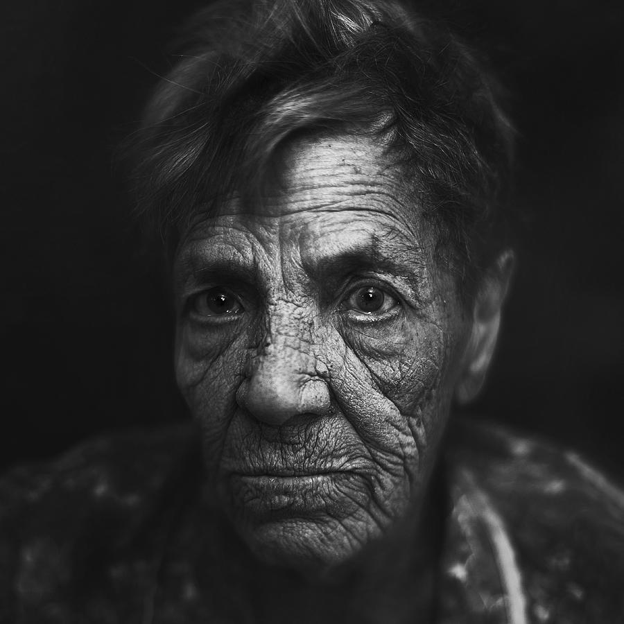 Close up of Senior Caucasian womans face #1 Photograph by Vladimir Serov