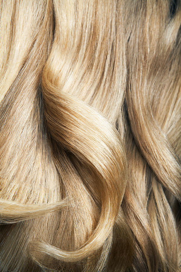 Close up shot of wavy, blond hair. #1 Photograph by Andreas Kuehn