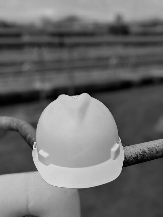 Closeup Of A Hard Hat At Industrial Plant #1 Photograph by Alex Grichenko
