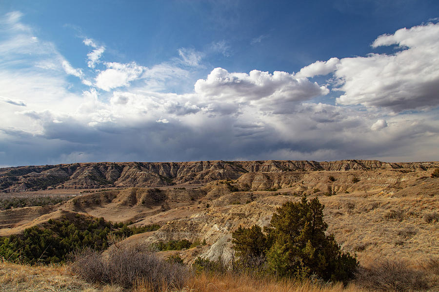 Clouds over Theodore Roosevelt National Park in North Dakota #1 Photograph by Eldon McGraw