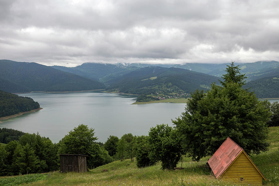 Cloudy landscape view from Lake Bicaz in Romania Photograph by Sebastian Radu