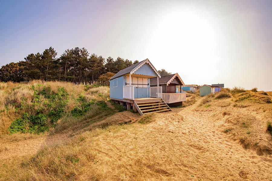 Coastal beach huts #1 Photograph by Chris Yaxley