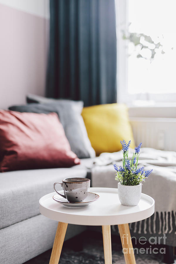 Coffee table in a small cozy apartment. #1 Photograph by Michal Bednarek
