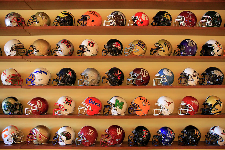 College Football helmets #1 Photograph by Chris Smith