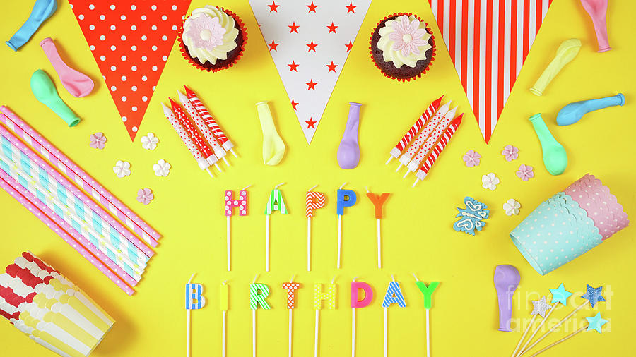 Colorful birthday party flat lay on yellow background. #1 Photograph by Milleflore Images