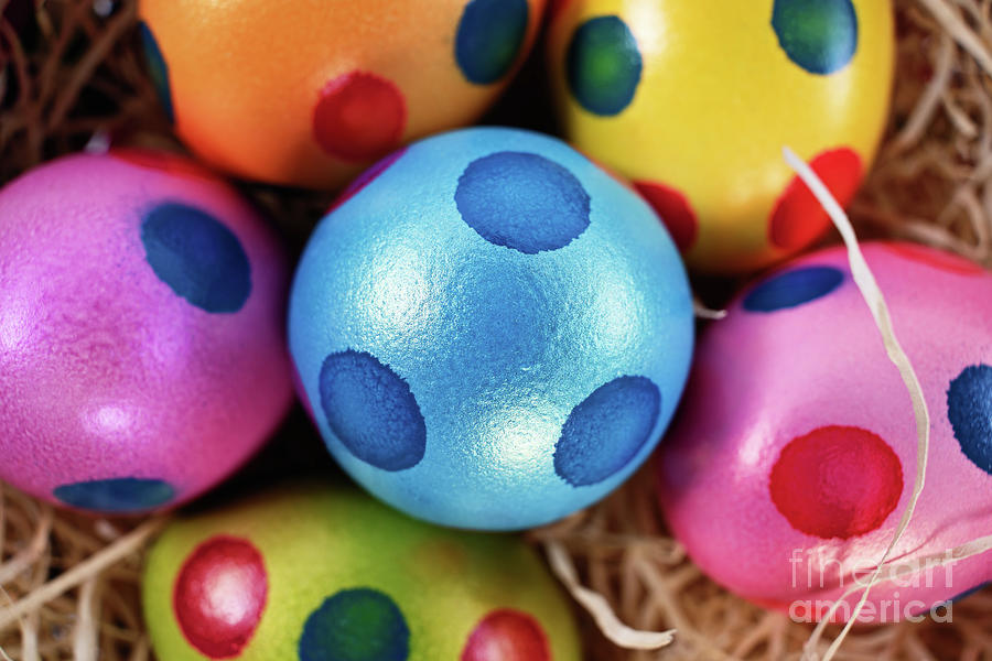 Colorful Easter eggs with polka dots in a basket #1 Photograph by Mendelex Photography