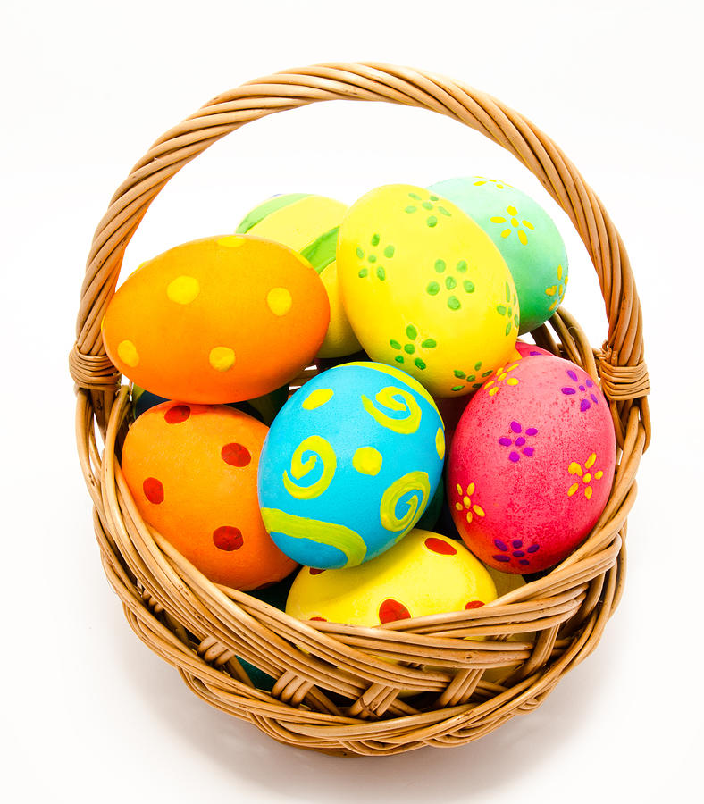 Colorful handmade easter eggs in the basket isolated #1 Photograph by SvitlanaMartyn