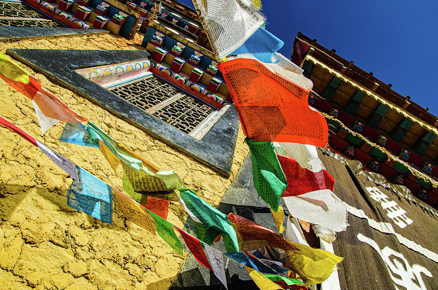 Colorful Tibetan prayer flags spreading good fortune #1 Photograph by Adelaide Lin