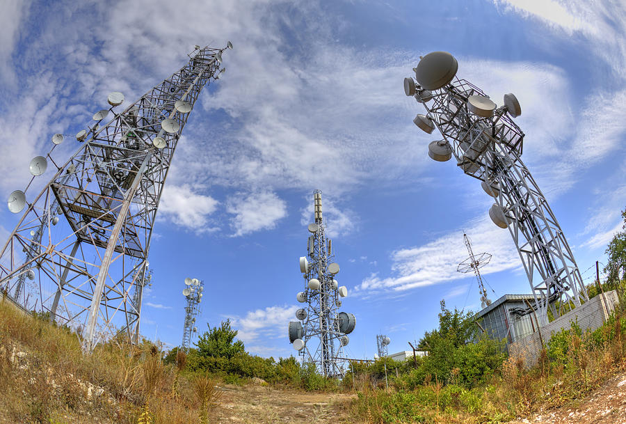 Communication antenna towers in fish-eye perspective #1 Photograph by Phadventure