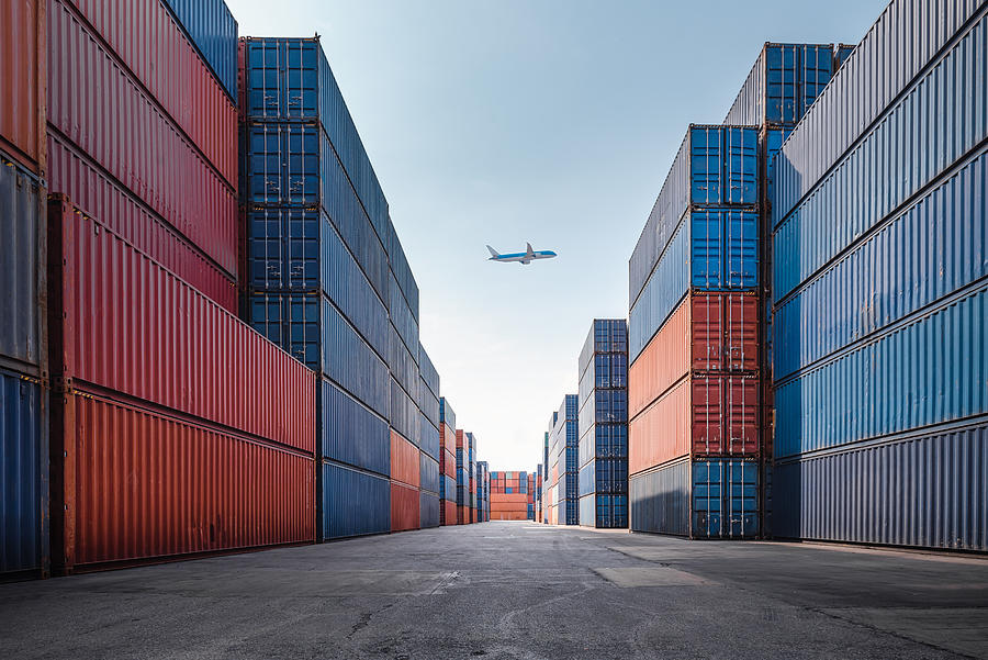 Container Cargo Port Ship Yard Storage Handling of Logistic Transportation Industry. Row of Stacking Containers of Freight Import/Export Distribution Warehouse. Shipping Logistics Transport Industrial Photograph by Kdp