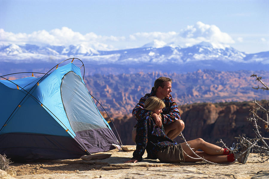 Couple camping by canyon landscape #1 Photograph by Comstock Images