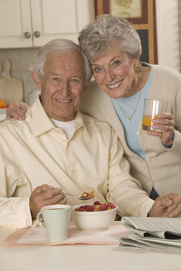 Couple having breakfast #1 Photograph by Comstock Images