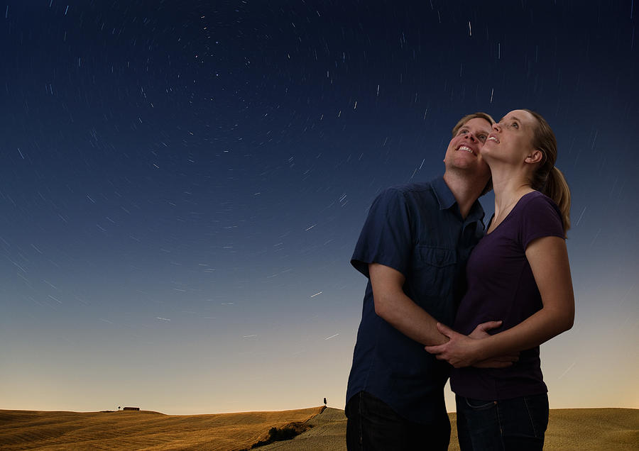 Couple Watching The Starry Night Sky #1 Photograph by Henglein and Steets