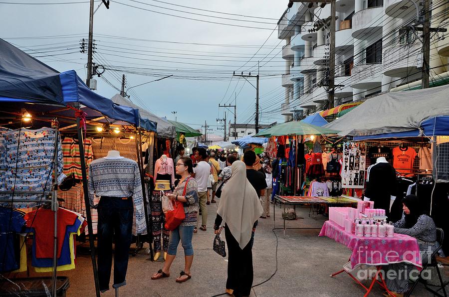 Crowds of people hang around outdoor street market shops and food stalls Pattani Thailand #2 Photograph by Imran Ahmed