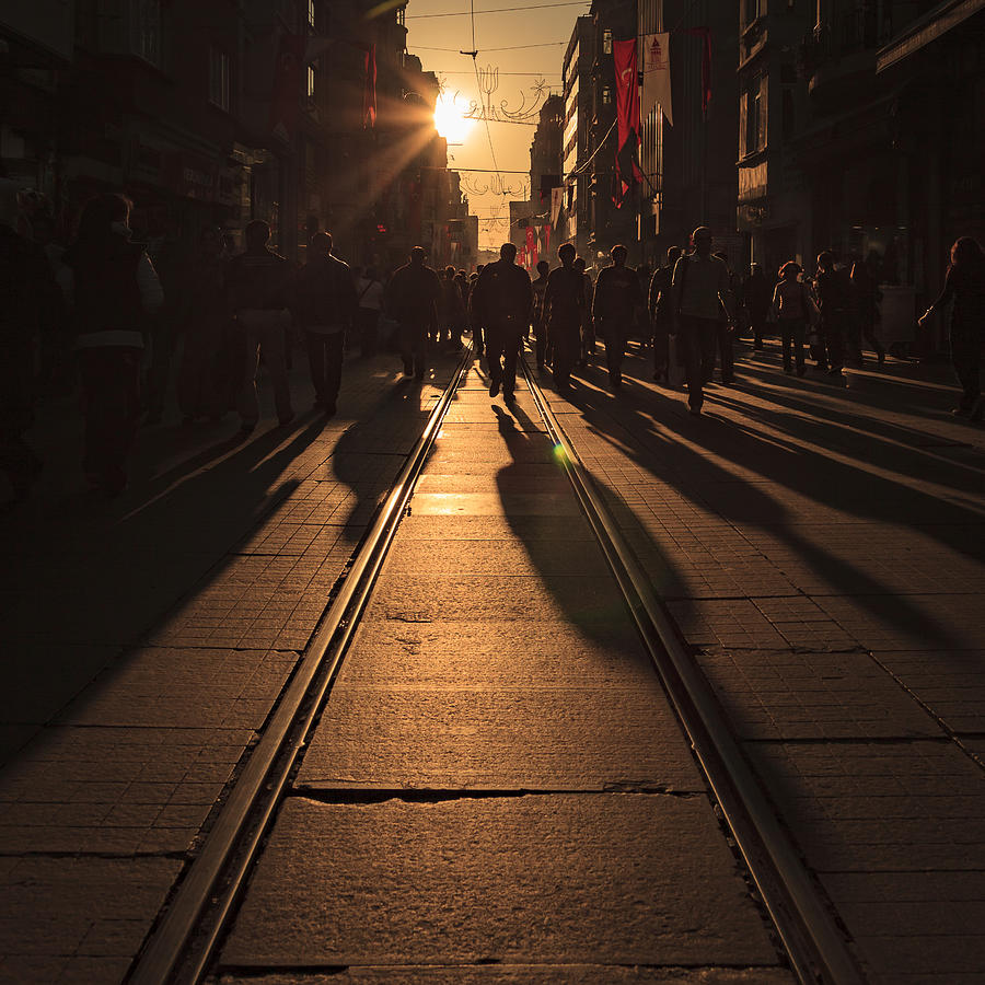 Crowds of shoppers and a tram on Istiklal Avenue in Istanbul, Turkey #1 Photograph by Kelvinjay