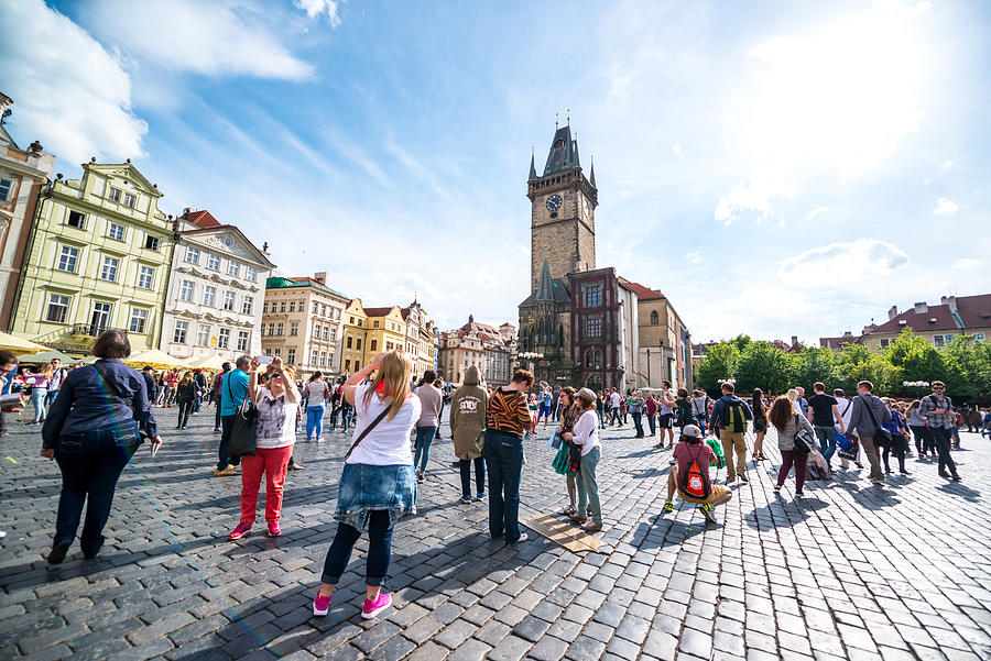 Crowds of tourists on Prague Old Town Square #1 Photograph by Anouchka