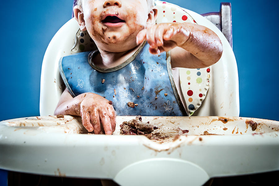 Cute Messy Baby Covered in Food #1 Photograph by RyanJLane