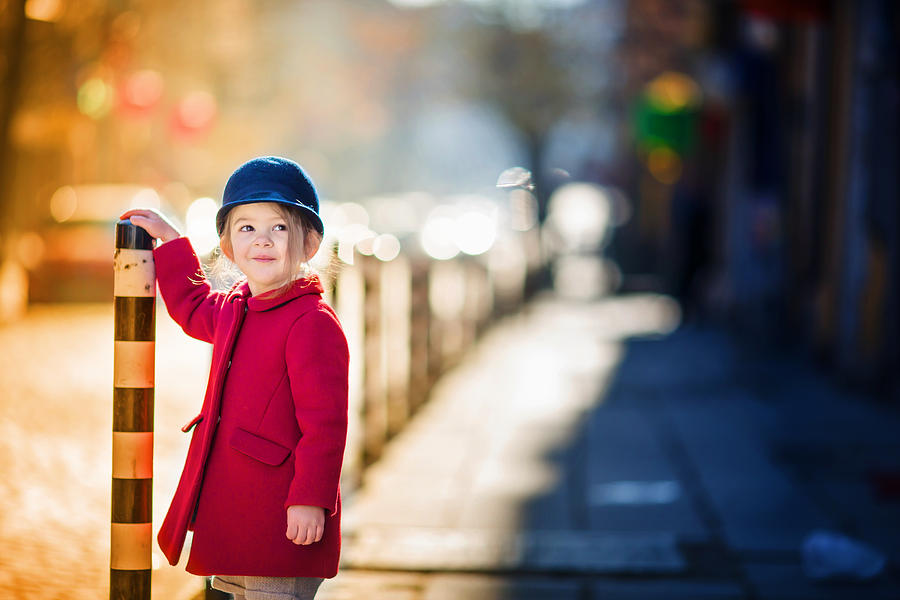 Cute smiling little girl with red coat and blue hat #1 Photograph by Daniela Solomon