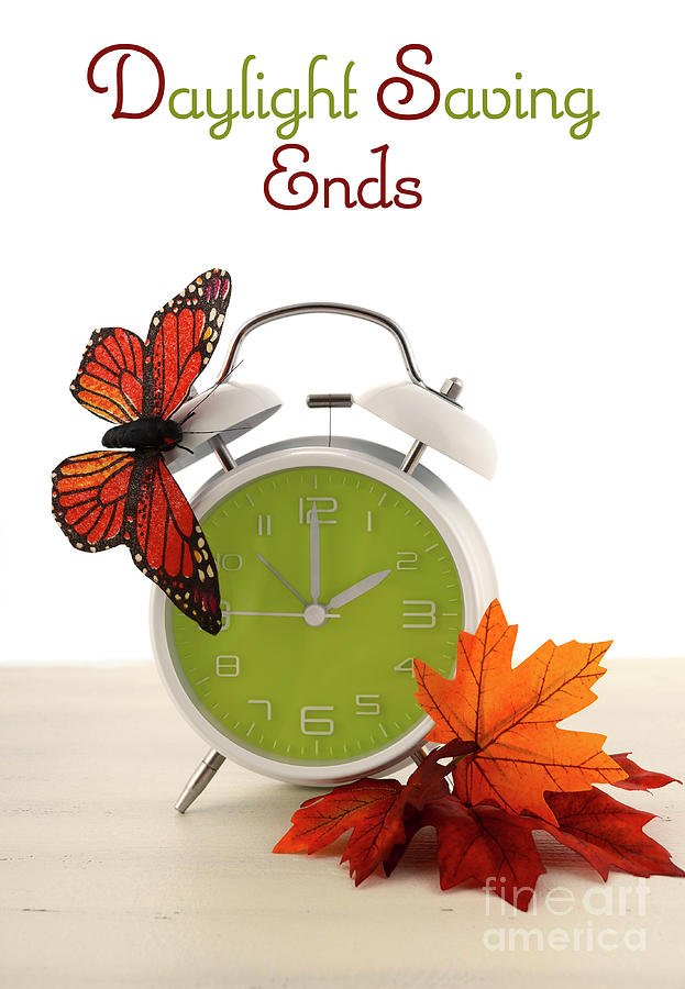 Daylight Saving Time Ends concept with Autumn Fall theme.  #1 Photograph by Milleflore Images
