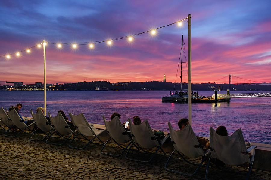 Sunset Photograph - Deck Bar by river Tagus #1 by Carlos Caetano