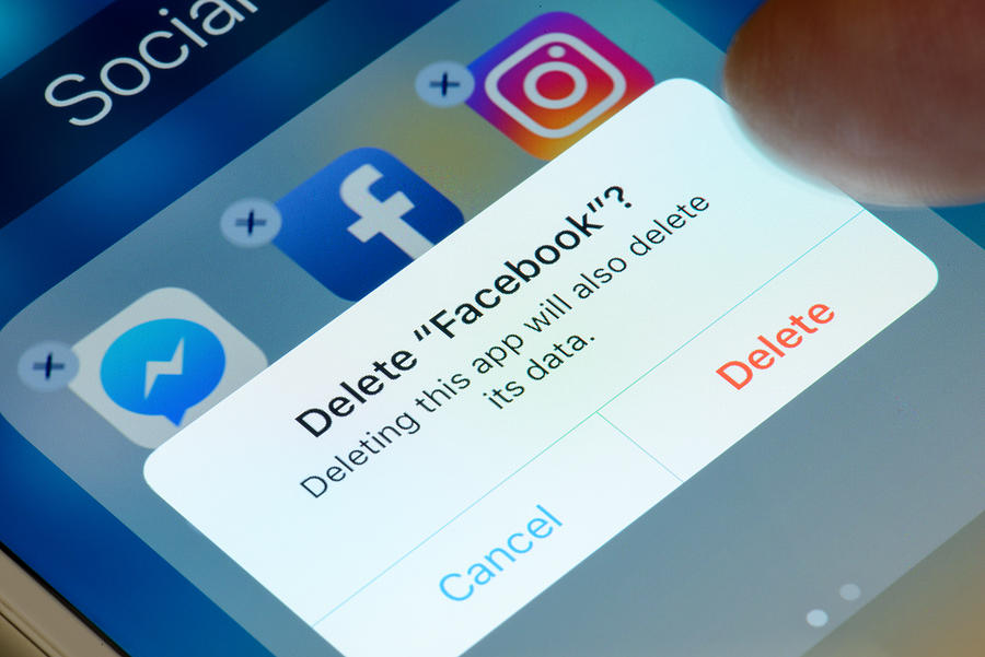 Deleting Facebook App from Smartphone #1 Photograph by Christopher Ames