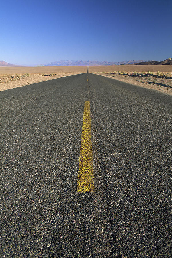 Desert highway #1 Photograph by Comstock Images