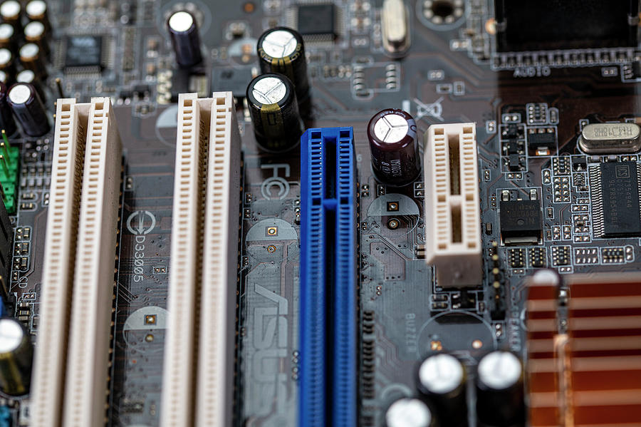 Detail Of A Motherboard With Connectors And Heatsinks Photograph by ...