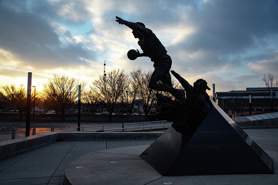 Earvin Magic Johnson statue at sunset at Michigan State University Photograph by Eldon McGraw