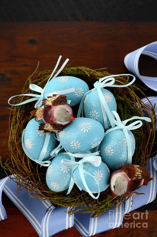 Easter birds nest with blue eggs. #1 Photograph by Milleflore Images