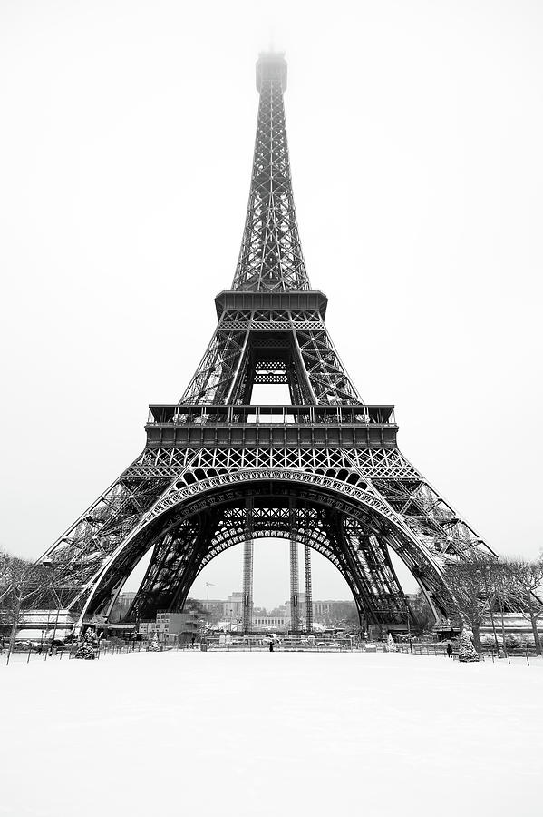 Eiffel tower under the snow #1 Photograph by Philippe Lejeanvre