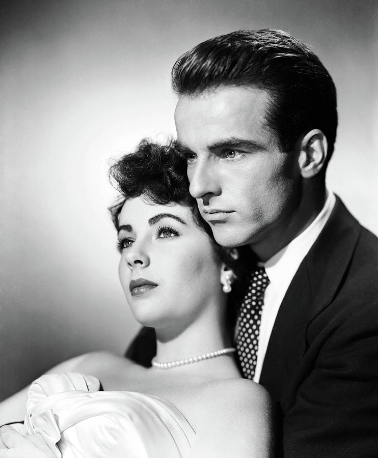 ELIZABETH TAYLOR and MONTGOMERY CLIFT in A PLACE IN THE SUN -1951-, directed by GEORGE STEVENS. #1 Photograph by Album